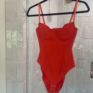 American apparel red bodysuit size Small.